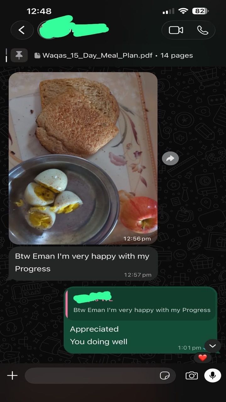 A client photo of toast, boiled eggs and an apple, with a message saying they are very happy with their progress